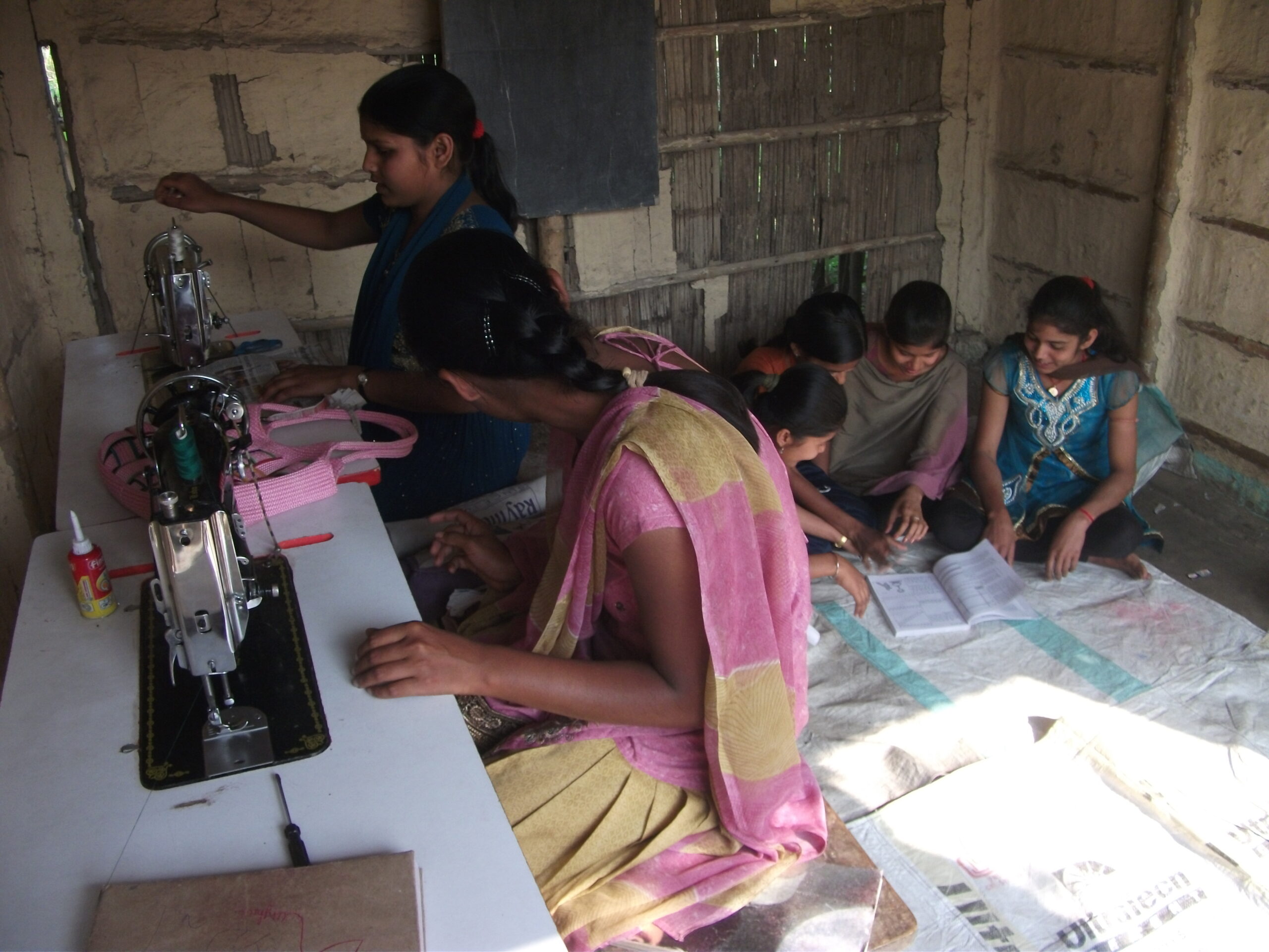 poor women learning sewing images