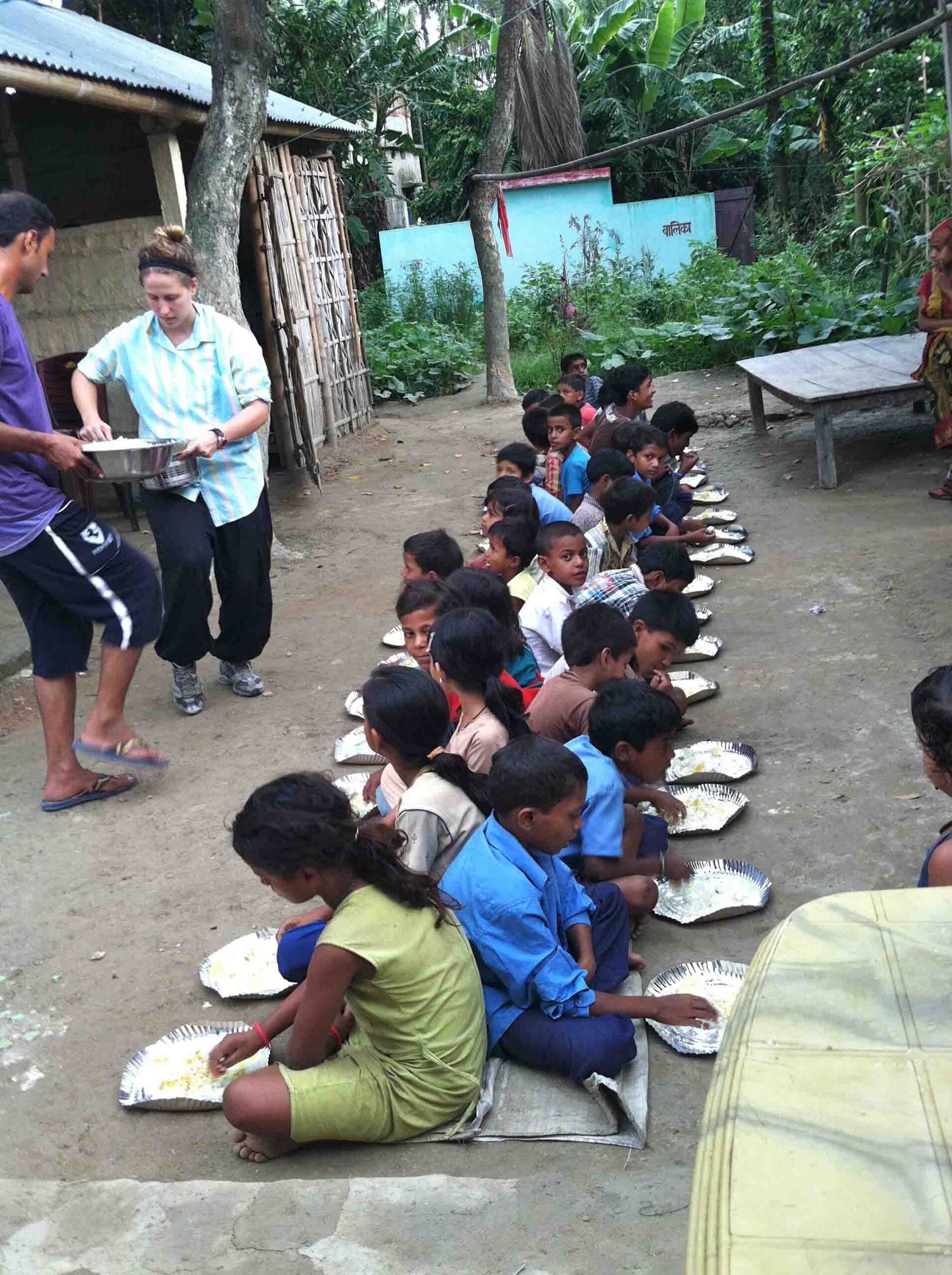 distribution of food to poor children images