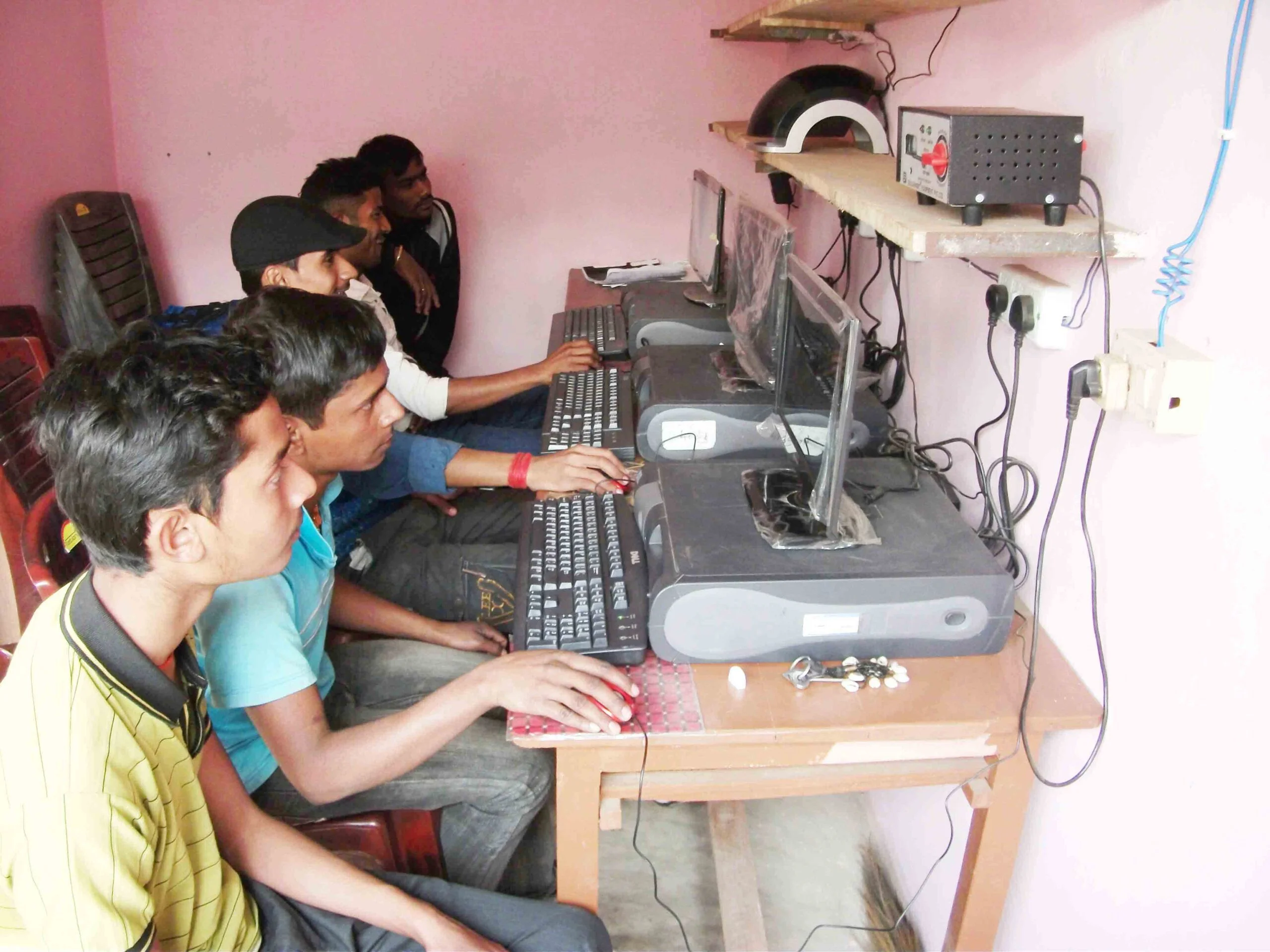 village boys learning computer images